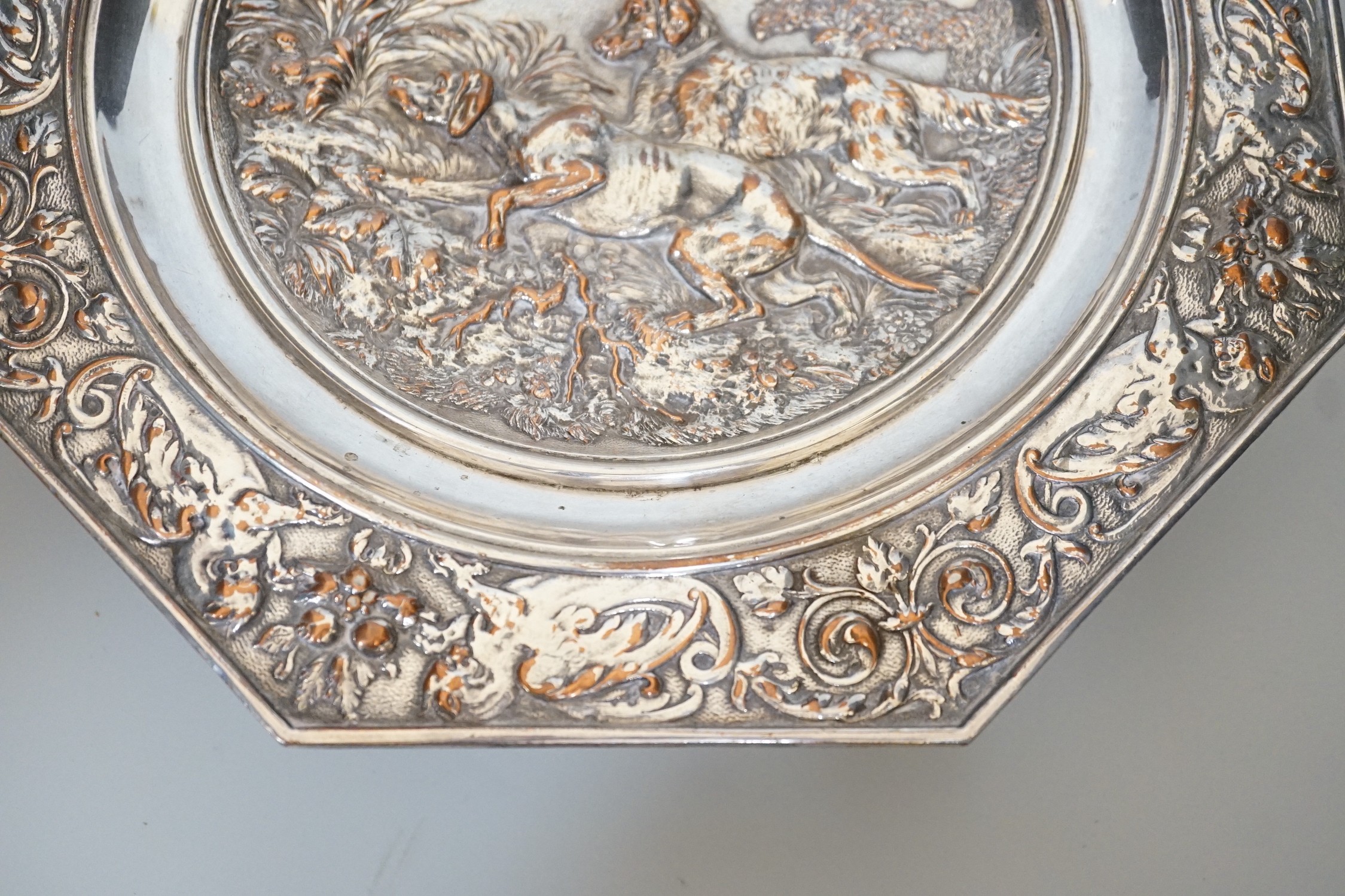 An early 20th century Elkington type silver plated tazza embossed with hunting dogs, 29cm